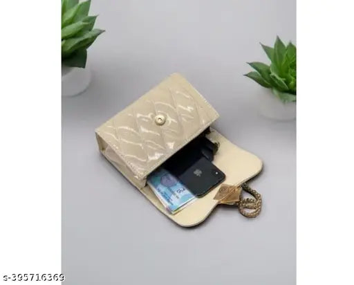 Yellow clutch with a wallet inside, on display, against a blurred background