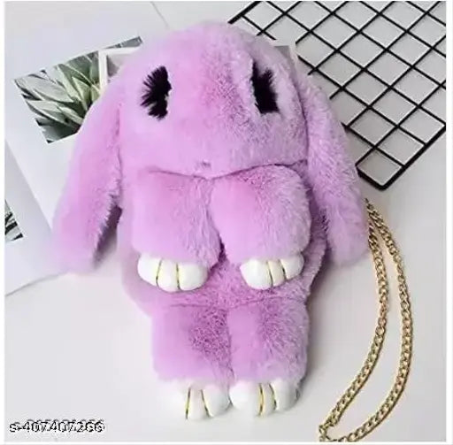 Pink stuffed toy rabbit in a purse. Stuffed animal in a pocketbook. Rabbit pouch in a bag. Animal purse with a zipper