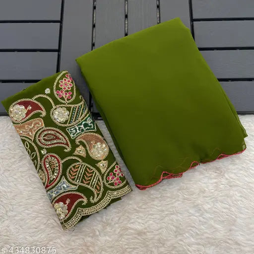 Green and gold paisley fabric pouch, possibly satin, with floral embroidery