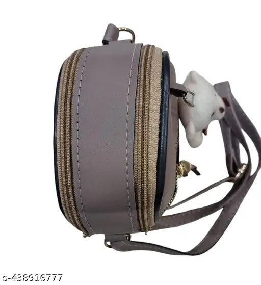 Gray and brown purse with teddy bear design