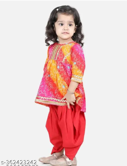 Red bandhej anarkali kurta and dhoti set with lace embellishments, cotton rayon material for party wear in Indian fashion style