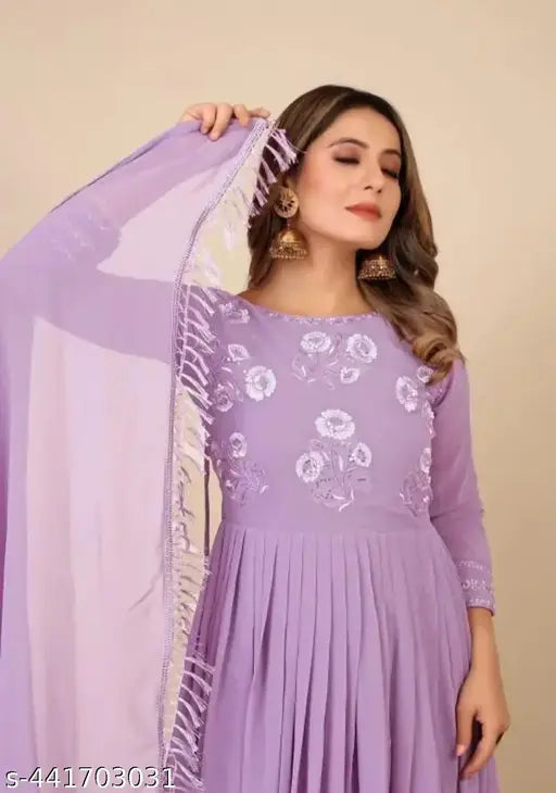 Lavender Georgette suit with lace dupatta, perfect for any occasion. Fox Georgette material and complete lining." (108 characters)