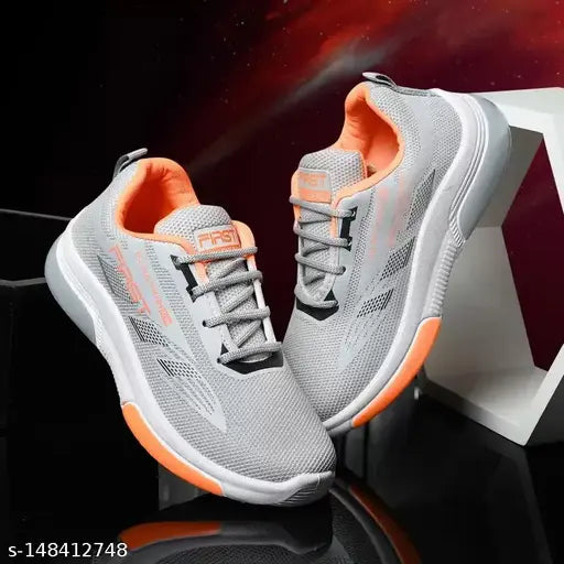 Grey adidas sports running shoes, orange accents, lace-up front