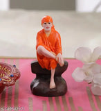 Orange poly resin Shirdi Sai Baba poshak, intricately hand-painted idol figurine on display shelf
