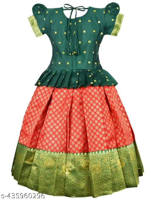 Blue and pink traditional Pattu Pavadai Lehenga Choli, royal blue embroidered blouse with short puffed sleeves and peplum style, vibrant pink skirt with golden zari work, Indian festive wear, perfect for special occasions
