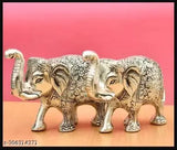 Silver-finished metal elephant pair decorative showpiece, intricate carvings, Indian artisanal craftsmanship, home décor accent (13cm x 9cm x 5cm, set of 2)