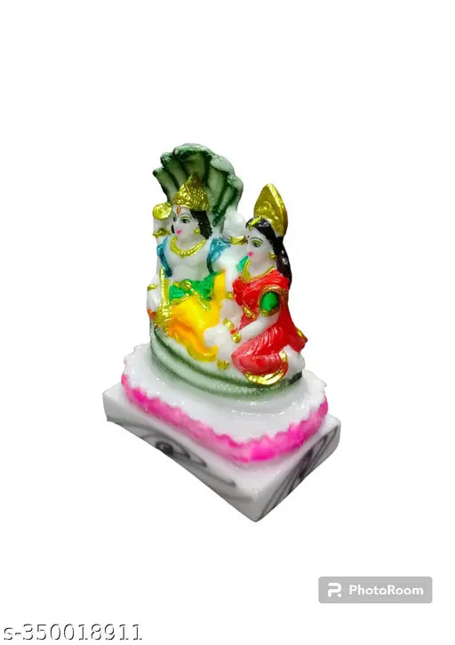 Idol of Lord Vishnu with a Goddess idol, colorful with gold accents