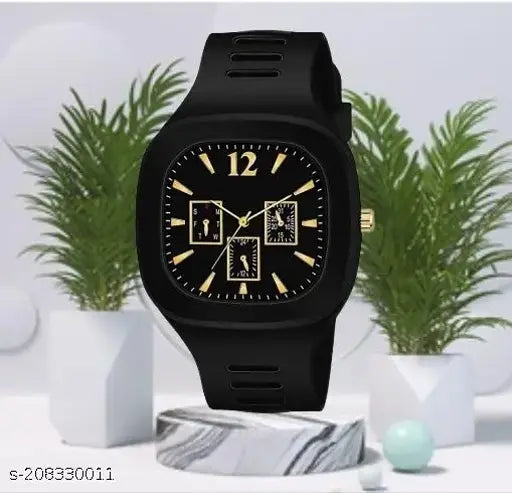 Black and gold analog men's wrist watch