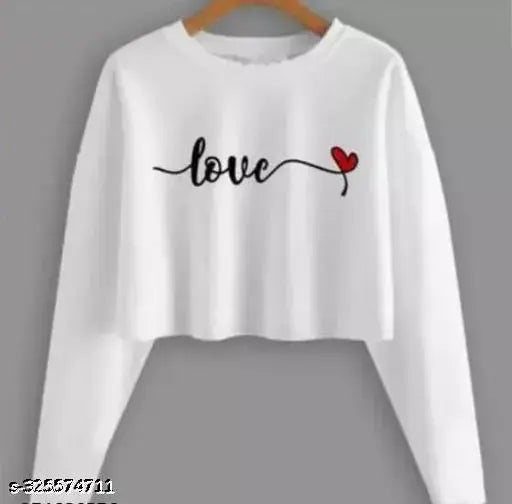 White cotton blend long sleeve crop top, printed net pattern, size S (32in bust, 17in length)