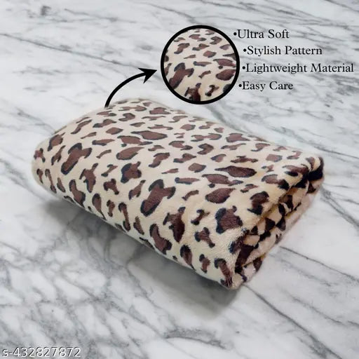 Lightweight, super-absorbent cotton bolls microfiber AC blanket. Soft animal net pattern. Made in India (100cm x 75cm)