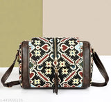 Women's ethnic pattern sling bag with a flap closure