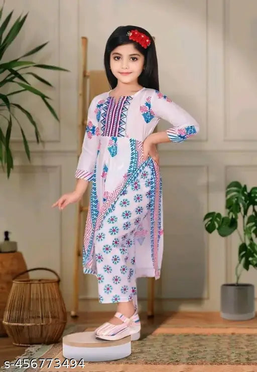 Green rayon printed kurti and palazzos set with lace border, ideal for girls' parties or special events
