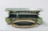 Women's trendy clutch purse with metal closure