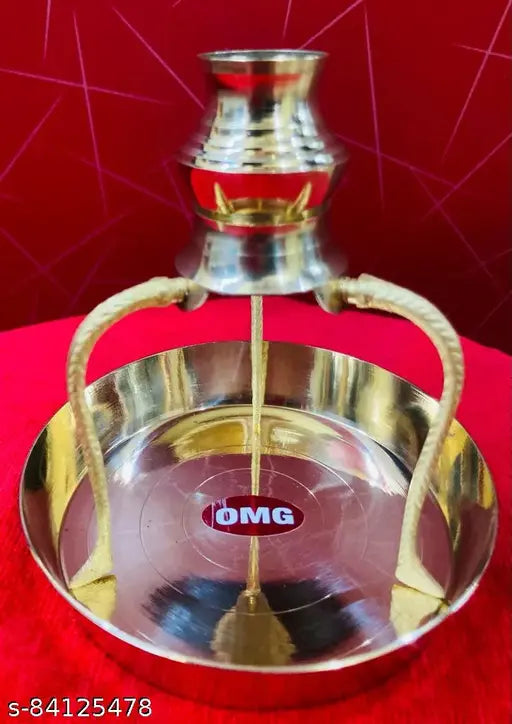 Shiny metal temple lamp, abhishek loti with a red base