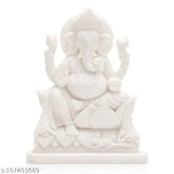 Marble Ganesh idol, white, adorned with a necklace, seated in front of books and a cat, 12cm tall