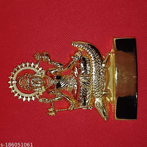 Gold metal pin with deity icon and red background