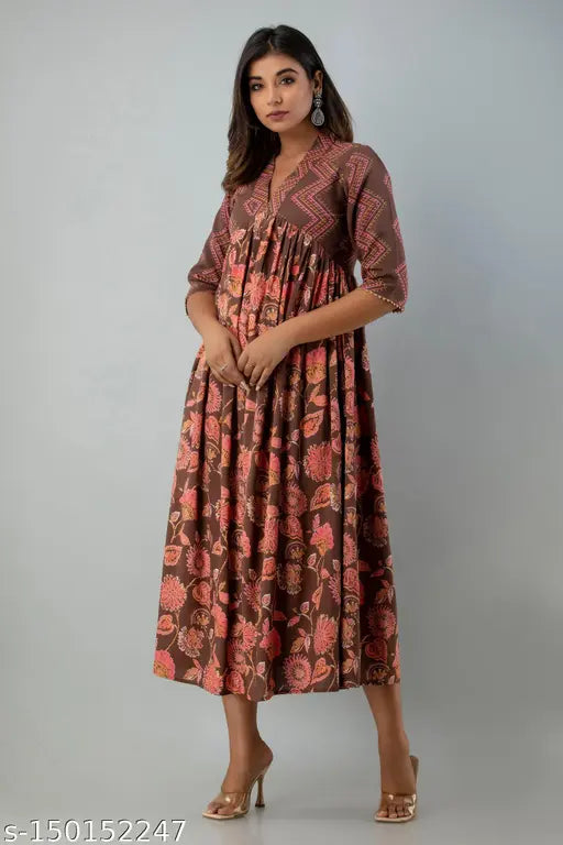 Brown Rayon Anarkali Kurta with floral print, V-neck and three-quarter sleeves. Ideal for parties, casual wear, travel, or office events. Authentic Indian brand assurance." (125 characters)