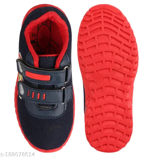 Black, red, and white sports shoes with Velcro closure