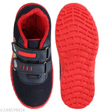 Black, red, and white sports shoes with Velcro closure