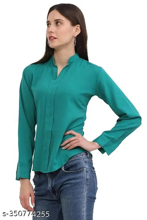 Jade green poly crepe formal top with notched neckline and full cuff sleeves for women