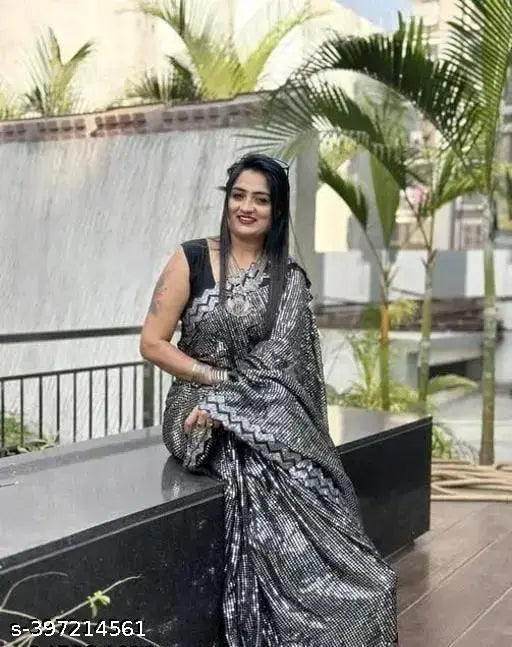 Black chiffon sari, intricate border pattern, knee-length