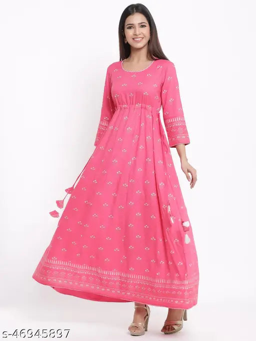 Pink rayon Anarkali dress by Kipek, featuring three-quarter sleeves and vibrant printed combo. Sizes: S (36in bust, 52in length), M (38in bust, 52in length), L (40in bust, 52in length), XXL (44in bust, 52in length). Indian ethnic wear for daily outfits
