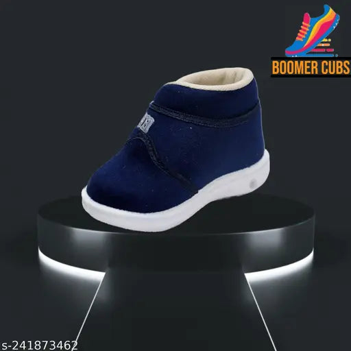 Navy blue shoes with white soles and whistle button