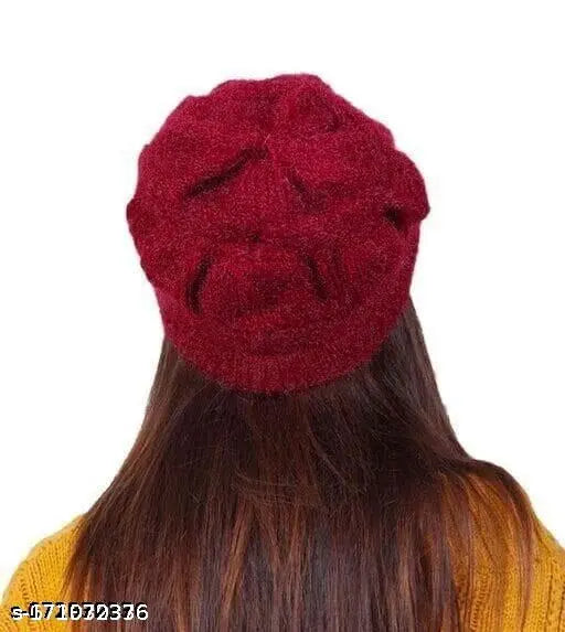 The image depicts a warm, soft knitted winter hat in red wool. It is designed in a modern style with a fluffy texture, suitable for cold weather