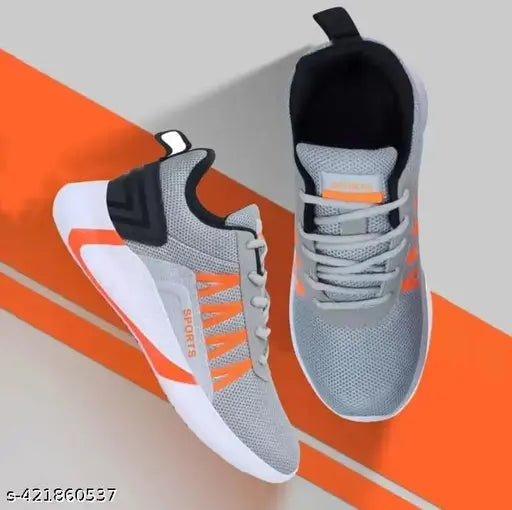 Easy slip-on sport shoes in black with orange accents, ideal for casual wear and park walks, durable for all day comfort