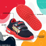 Red Velcro sports running shoes with white sole