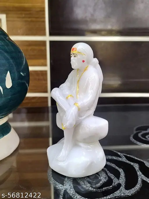 A white marble idol of Shirdi Sai Baba, seated, pooja statue, 35 inches in height