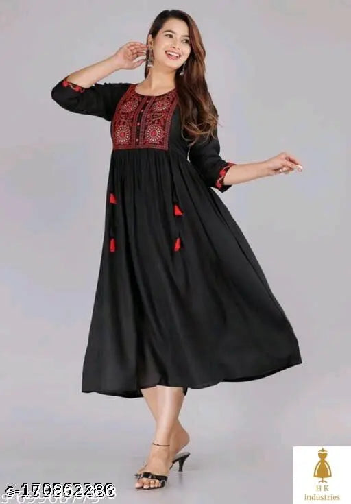 Black embroidered kameez with long flared skirt