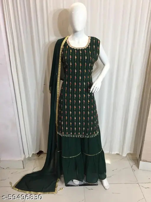 Green and gold dupatta set with detailed embroidery