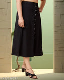 Black imported cotton blend midi length women's skirt, solid pattern for fashionable attire on model