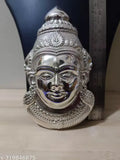 Brass Indian god idol - Lakshmi face, Lakshmi Mukhuta, intricately detailed figure on display
