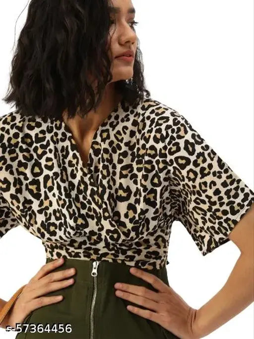 Off-white black animal print crepe blouson crop top, polyester, short sleeves, extended sleeves - Style Quotient women's fashion on hanger