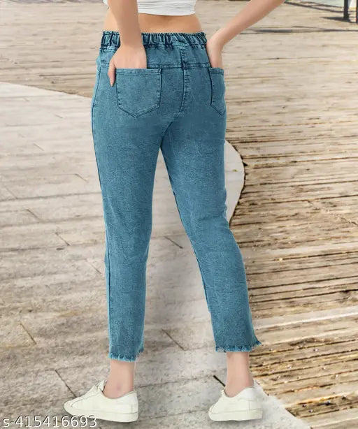 High-waisted stretchable premium blue denim jogger jeans with knee slit and relaxed fit for women