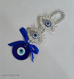 Silver and blue Turkish Evil Eye Vastu net enhances harmony, peace, and prosperity. Decorative God's Eye wall hanging with bead works, designed for home or office protection." (124 characters)