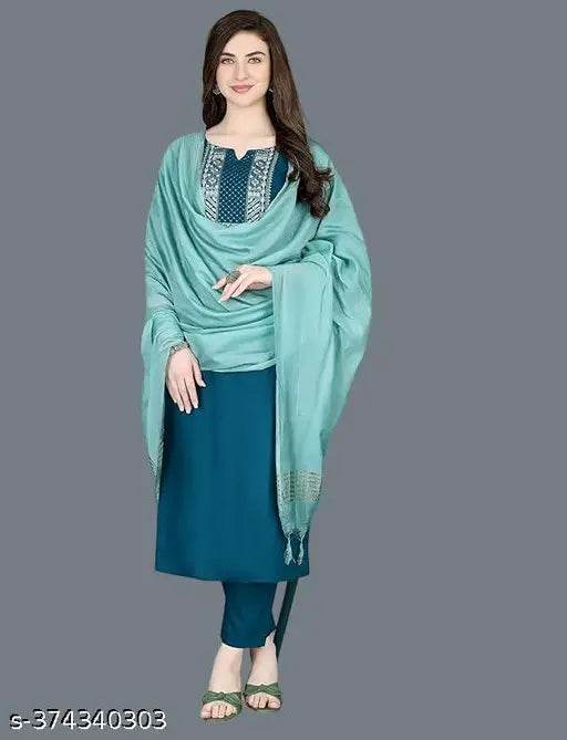 Dark blue embroidered cotton kurti pant and dupatta set, perfect for traditional wear and parties. Soft, vibrant print on straight-cut kurti with 3/4 sleeves. Pants and dupatta also made from soft cotton fabric. Set includes 1 kurti, pants, and dupatta. Available in sizes S to XXL. Made in India