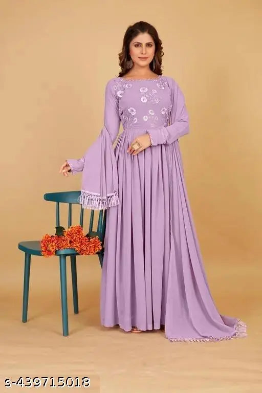 Georgette embroidered work gown with less border dupatta set, heavy georgette fabric in printed pattern. Available sizes: S-XXXL. Indian fashion on display