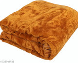 Orange faux fur blanket, plush and soft texture, double bed size