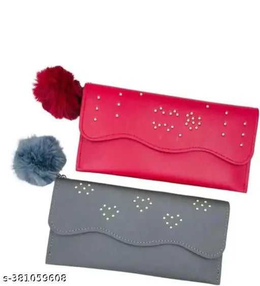 Pink and gray faux fur wallets with a red pouch, zip closure