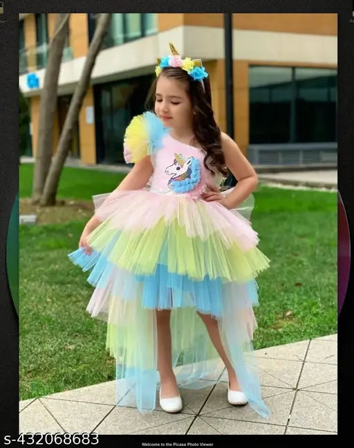 Colorful ruffled child's dress, tutu style, unicorn design