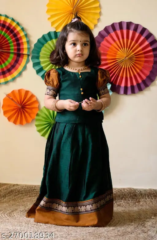 Traditional baby girl polyester blend lehenga choli set, featuring soft silk top and lehenga with zari stitch and woven patterns. Suitable for various occasions like weddings, parties, or festivals