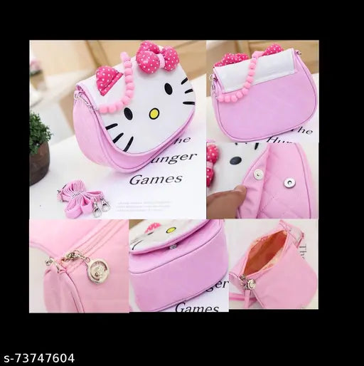 A cartoon character crossbody hand purse with a pink zipper, in a light pink fabric, accompanied by a phone case and a pen in the background