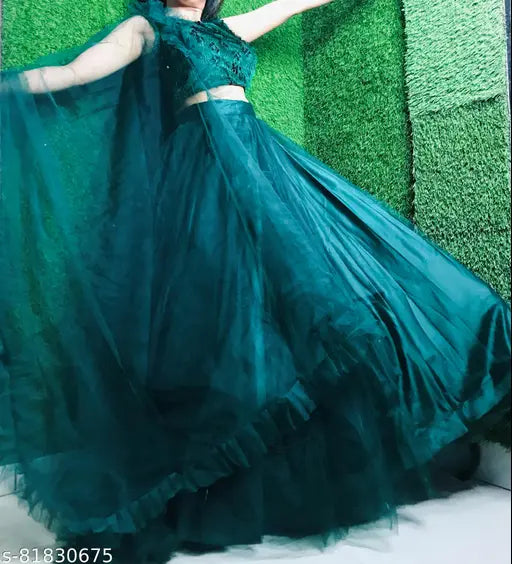 Green jute-silk indo western lehenga, embroidered net choli and dupatta for Mehndi functions. Stylish semi-stitched dress suitable for weddings and festivals