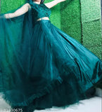 Green jute-silk indo western lehenga, embroidered net choli and dupatta for Mehndi functions. Stylish semi-stitched dress suitable for weddings and festivals
