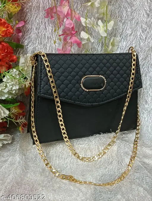 Quilted PU ladies' handbag with golden chain strap, black with gold trim