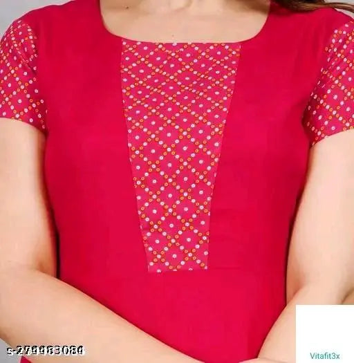 The image shows a red shirt with short sleeves and a V-neck design, displayed on a mannequin. It has a plain front panel with what appears to be a geometric pattern near the hem