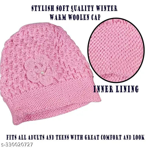 Pink knitted cap with a floral design on the front, made from wool